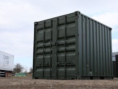 used cut down 10ft container in refurbished condition painted dark green