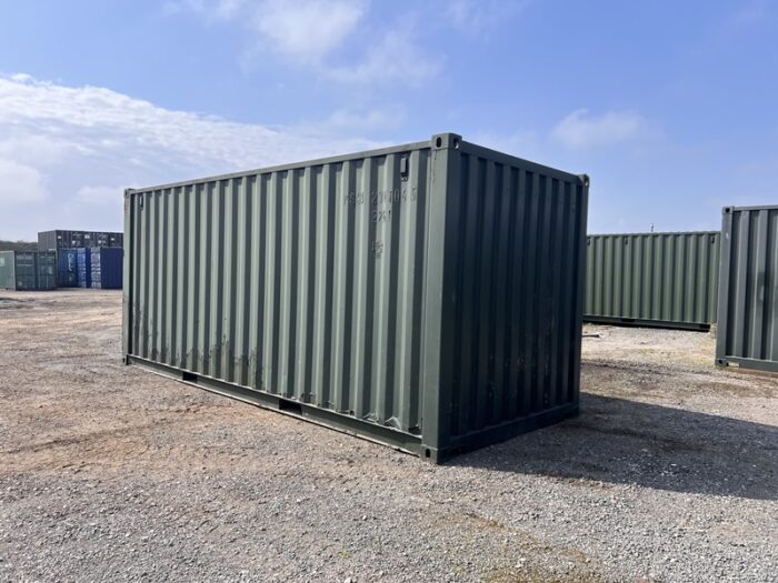 Rear and side view of 20ft dark green container painted with some minor wear on lower panels