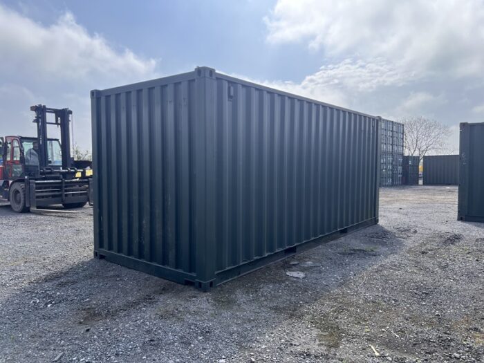 Angled view of a green 20ft container with ISO markings and strong steel body