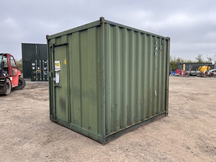 Front-right angle of 8ft ex-hire green container with access door visible