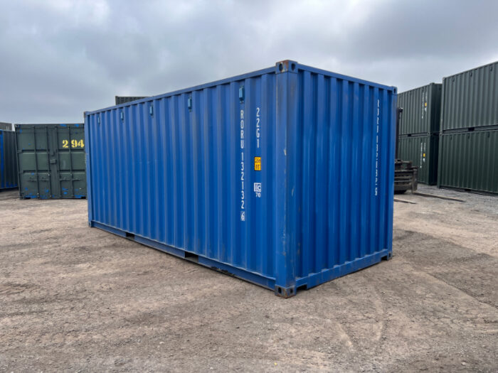 Rear corner and side angle of a Grade A blue 20ft container with lockable doors