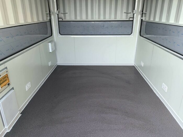 interior of 10ft container kiosk with insulated walls, non-slip flooring and electrical sockets