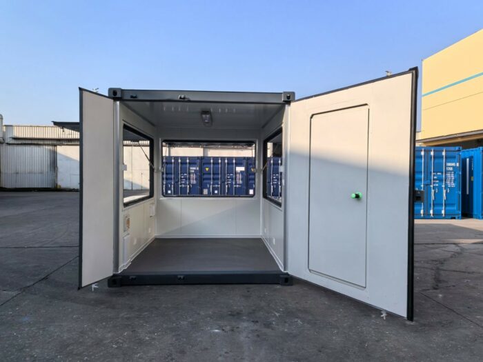 interior of 10ft container kiosk showing serving hatches and personnel door, insulated steel unit
